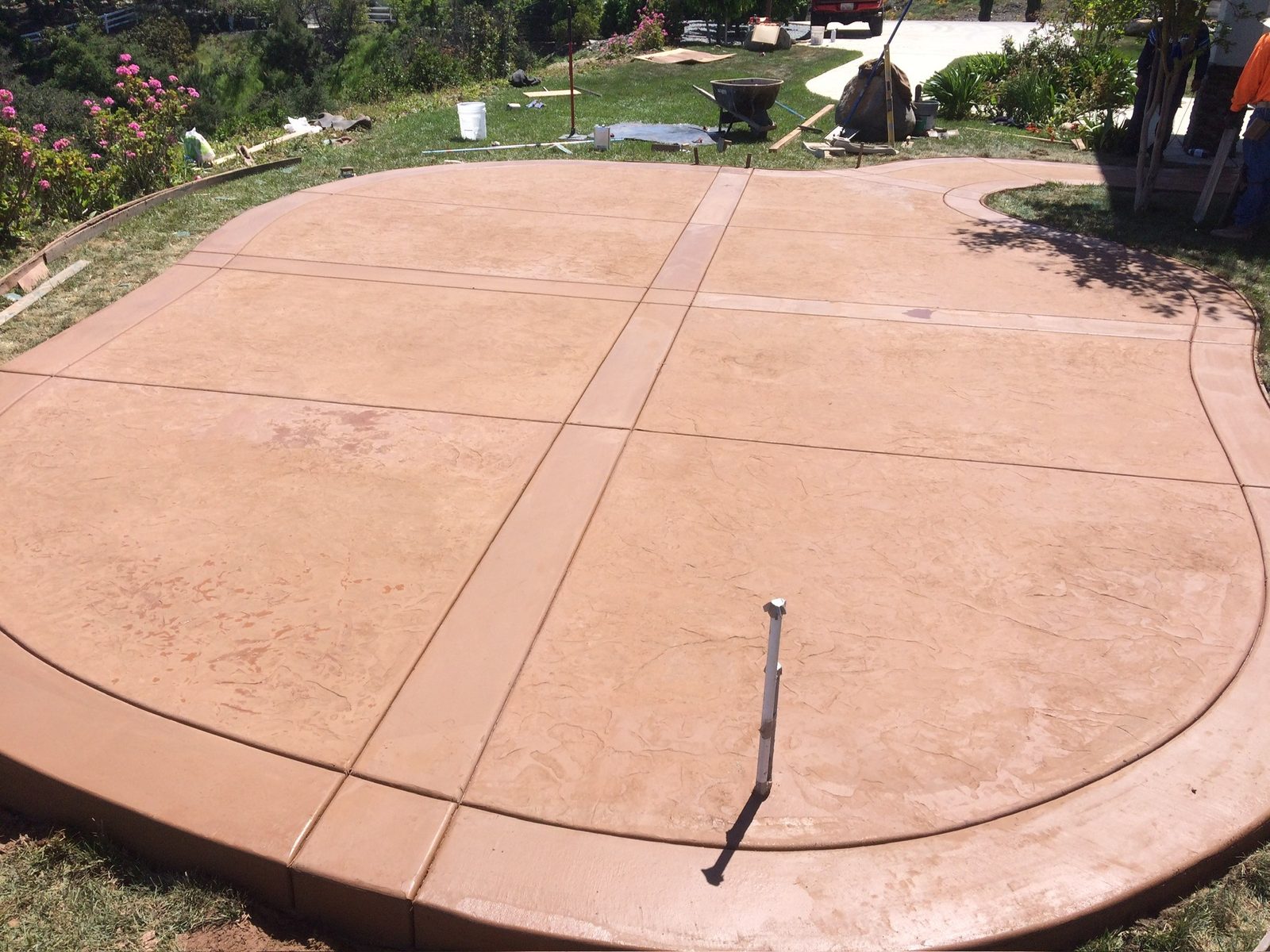 Custom terracotta colored stamped concrete patio