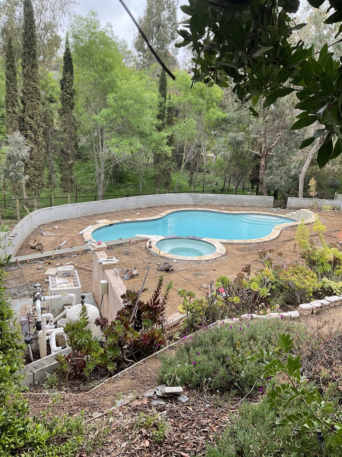 Pool deck with stamped grid pattern in progress